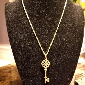 18" Necklace with key pendant.